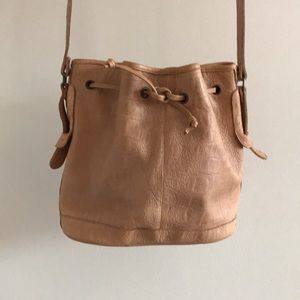 Vintage leather drawstring bucket bag.